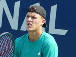 Jakub Mensik (CZE) on the Court with Triastan Boyer (USA), July 30, 2025. 