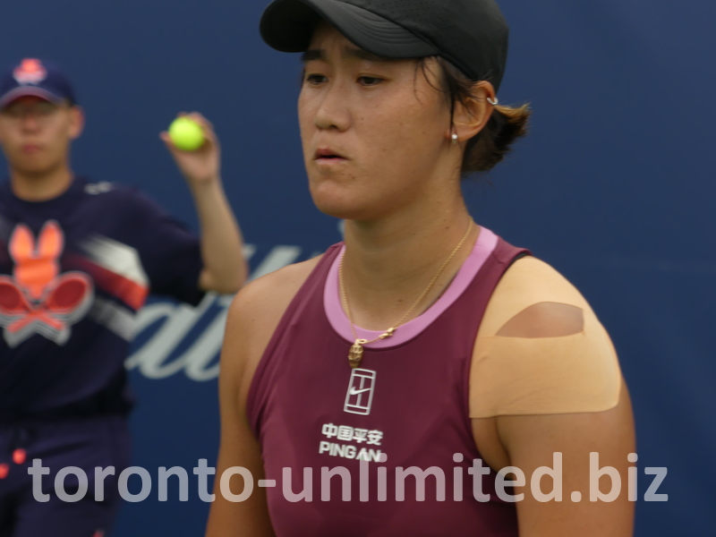 Is there disappointment on Xiyu WANG's face now?