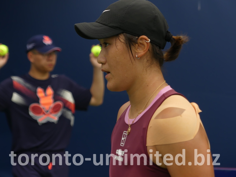 Close-up of Xiyu WANG's face.