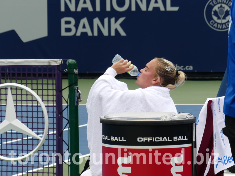 Sara Bejlek drinks water during her break.
