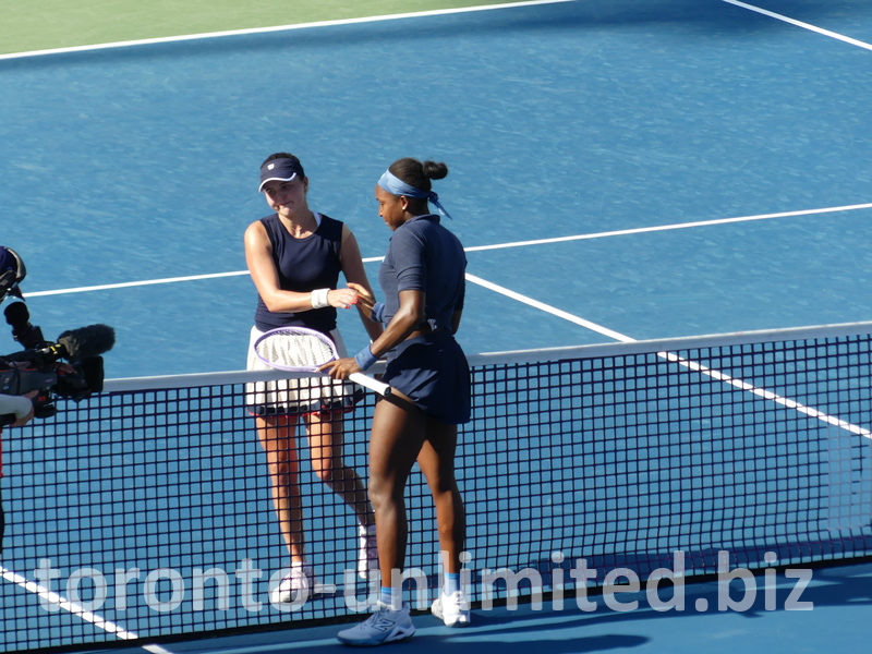 Coco Gauff has just won her match against Kayla Day, and they are shaking hands.