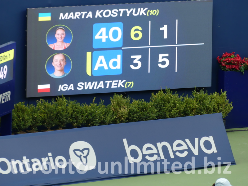 Centre Court score board shows: Marta KOSTYUK UKR Vs.  Iga SWIATEK: 6:3, 1:5