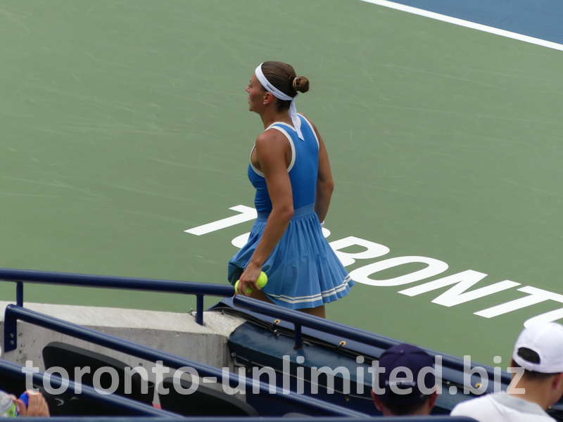 Marta Kostyuk walks on the Court.