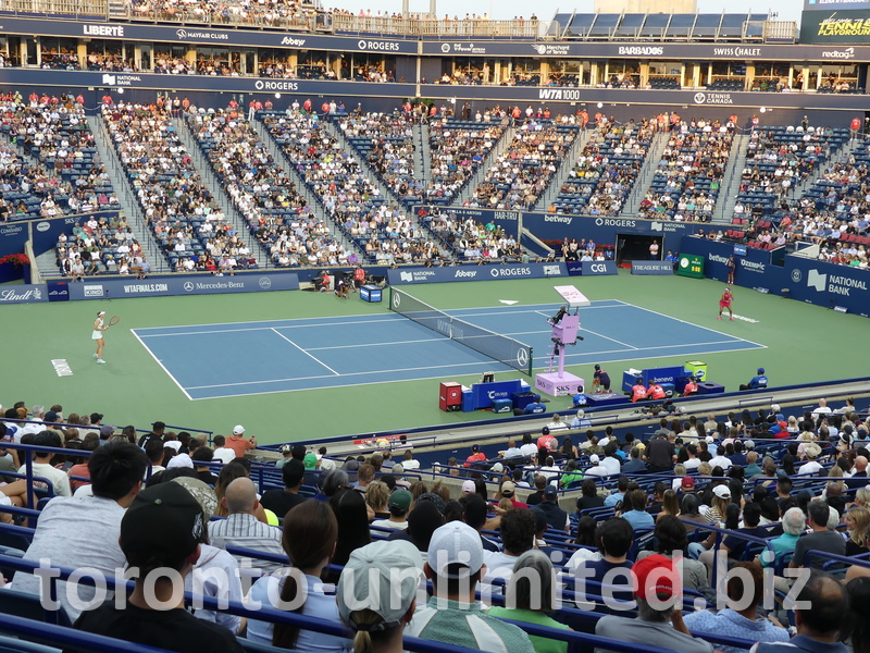Naomi OSAKA JPN and Elena RYBAKINA playing on Central Court.
