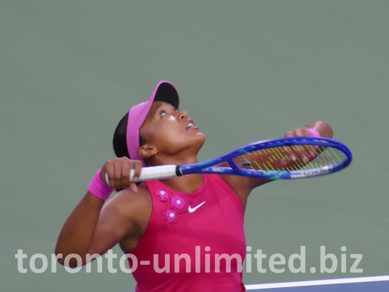 This is a high serve's toss-up that Naomi Osaka is following.