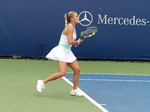 Sara Bejlek in play in match with Xiyu Wang.