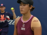 Is there disappointment on Xiyu WANG's face now?