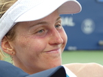 Sweaty, but happy Liudmila Samsonova's face.