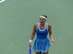 Marta Kostyuk gesticulates on the Court.
