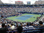 Centre Court photo match Swiatek Vs. Kostyuk, and the scoreboard shows Iga Swiatek at match point.