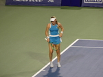 Grimacing Elina Svitolina before serving to Alexandrova.