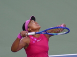 This is a high serve's toss-up that Naomi Osaka is following.