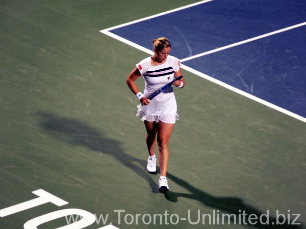 Kim Clijster on the court against Elena Baltacha.