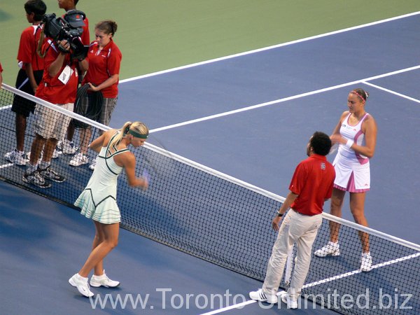 Coin toss, Maria Sharapova and Nadia Petrova.