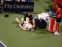 Alisa Kleybanova with trainer's assistance.