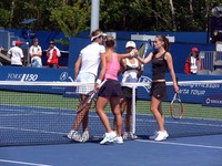 Handshake after the match. Benesova, Zahlavova and Lagostera Vives and Martinez Sanchez.