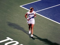 Kim Clijster on the court against Elena Baltacha.