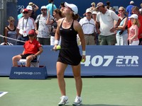 Samantha Stosur on Grandstand against Heidi El Tabakh of Canada.