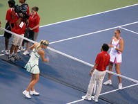 Coin toss, Maria Sharapova and Nadia Petrova.