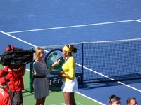 Serena Williams in post game, on court interview.