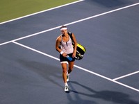 Yaroslava Shvedova leaving Stadium Court, 19 August 2009.