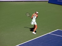 Maria Sharapova playing Sybille Bammer on Stadium Court.