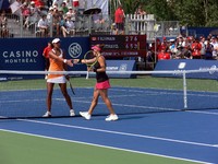 Sharon Fichman and Anne Keothavong shaking hands.