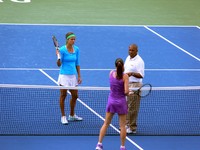 Julia Georges and Jelena Jankovic with coin-toss.