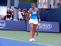 Petra Kvitova concentrating on her serve.