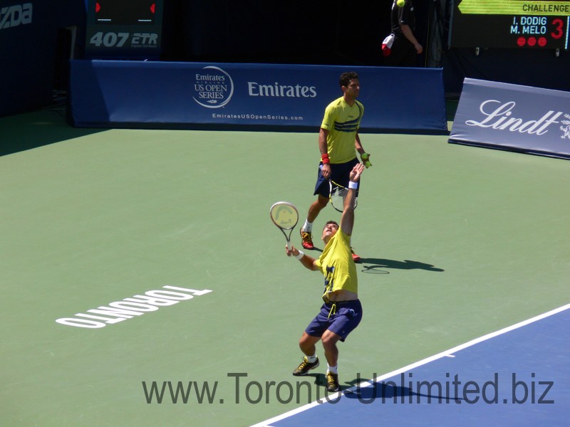 Marcelo Melo (BRA) serving on Stadium Court. Doubles final August 10, 2014 Rogers Cup Toronto