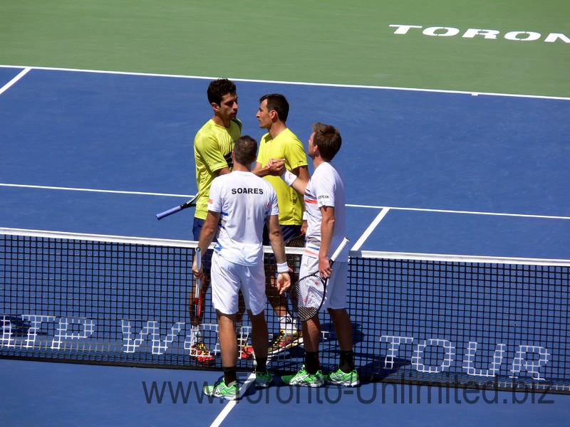 Winners Alexander Peya and Bruno Soares shake hands with Ivan Dogic and Marcelo Melo. August 10, 2014 Rogers Cup Toronto