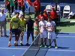 Ivan Dogic (CRO), Marcelo Melo (BRA) in yellow and Alexander Peya (AUT), Bruno Soares (BRA) posing for photos. Doubles final August 10, 2014 Rogers Cup Toronto  