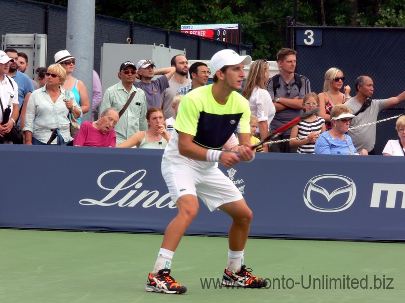 Filip Pelivo (CDN) receiving on the Grandstand Court August 2, 2014 Rogers Cup Toronto