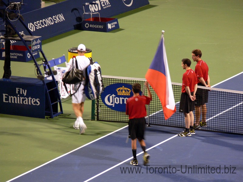 Tomas Berdych (CZE) coming with Czech flag to Stadium Court to play Yen-Hsun LU (TPE) August 6, 2014 Rogers Cup Toronto