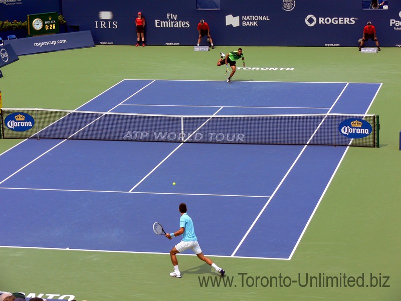 Djokovic to return serve to Jo-Wilfried Tsonga (FRA) on Stadium Court August 7, 2014 Rogers Cup Toronto