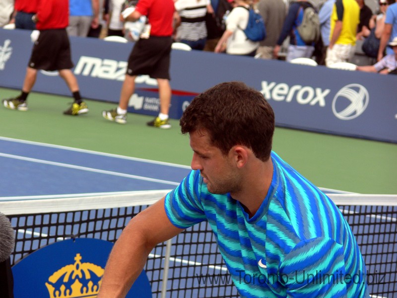 Grigor Dimitrov (BUL) signing autographs on Grandstand Court August 7, 2014 Rogers Cup Toronto