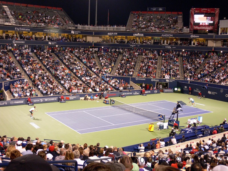 Marin Cilic (CRO) and Rogers Federer (SUI) playing on Stadium Court August 7, 2014 Rogers Cup Toronto