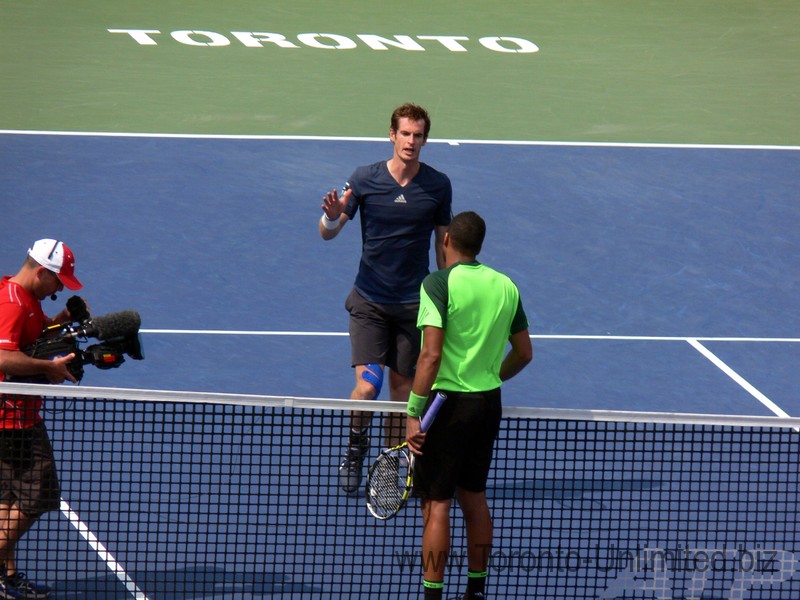 Tsonga and Murray shake hands. Tsonga has won quarter final match on Stadium Court, Rexall Centre August 8, 2014 Rogers Cup Toronto