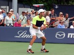 Filip Pelivo (CDN) receiving on the Grandstand Court August 2, 2014 Rogers Cup Toronto