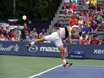 Filip Pelivo serving on the Grandstand Court August 2, 2014 Rogers Cup Toronto