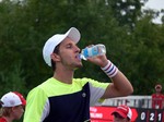 Filip Pelivo taking refreshing water during the qualifying match August 2, 2014 Rogers Cup Toronto 