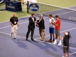 CEO ATP Americas Mark Young presents Tournament Director Karl Hale with a trophy August 6, 2014 Rogers Cup Toronto 