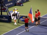 Tomas Berdych (CZE) coming with Czech flag to Stadium Court to play Yen-Hsun LU (TPE) August 6, 2014 Rogers Cup Toronto