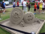 Sand sculptures showing a racquet and tennis ball, at Rogers Cup Toronto 2014