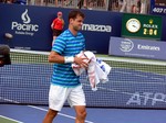Grigor Dimitrov is giving towels away to the spectators, after the win over Tommy Robredo August 7, 2014 Rogers Cup Toronto