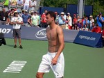 Shirtless and happy Grigor Dimitrov on the Grandstand Court August 7, 2014 Rogers Cup Toronto