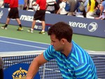 Grigor Dimitrov (BUL) signing autographs on Grandstand Court August 7, 2014 Rogers Cup Toronto