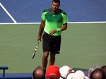 Jo-Wilfried Tsonga behind baseline on Stadium Court August 8, 2014 Rogers Cup Toronto