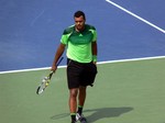 Jo-Wilfried Tsonga walking behind baseline. Stadium Court August 8, 2014 Rogers Cup Toronto