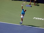 Grigor Dimitrov (BUL) serving on the Stadium Court to Tsonga, August 9, 2014 Rogers Cup Toronto